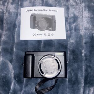 Black Digital Camera with User Manual